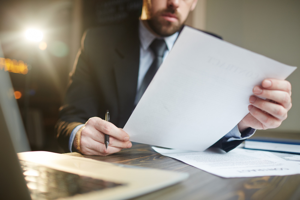 businessman-working-with-documentation-desk